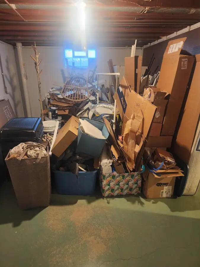 Roll-off dumpster container at job site for Construction Dumpster Rental in Islip